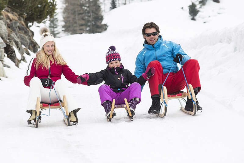 Tobogganing in Tux Zillertal, winter holiday with the family in Tyrol